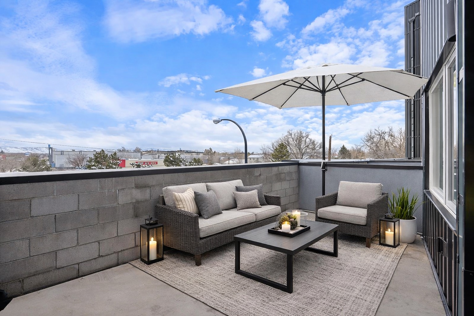 Private outdoor balcony with views at The Cooper luxury apartments in Lakewood, near the Rocky Mountains and Denver