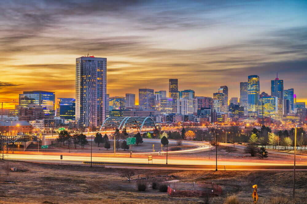 Denver city skyline views from The Cooper luxury apartments in Lakewood, Colorado with Rocky Mountain backdrop
