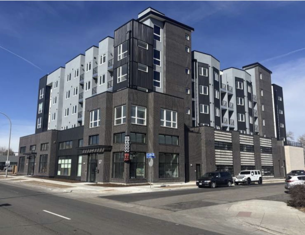 Modern facade of The Cooper apartments in Lakewood, located 15 minutes from Downtown Denver