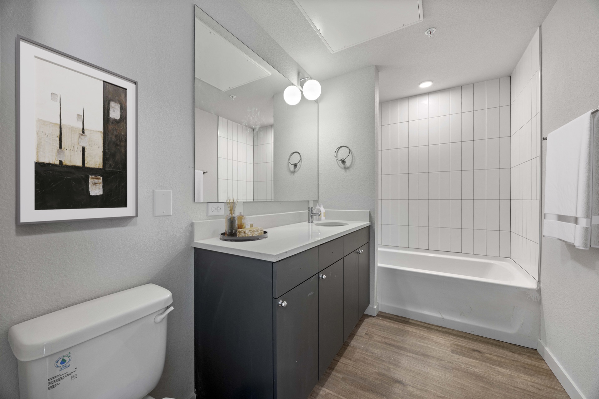 Spa-inspired modern bathroom with premium fixtures and finishes at The Cooper luxury apartments in Lakewood, Colorado
